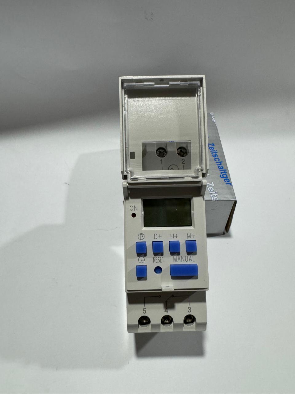 Digital timer switch 1450 with open cover